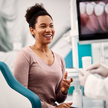 a patient speaking with her dentist 